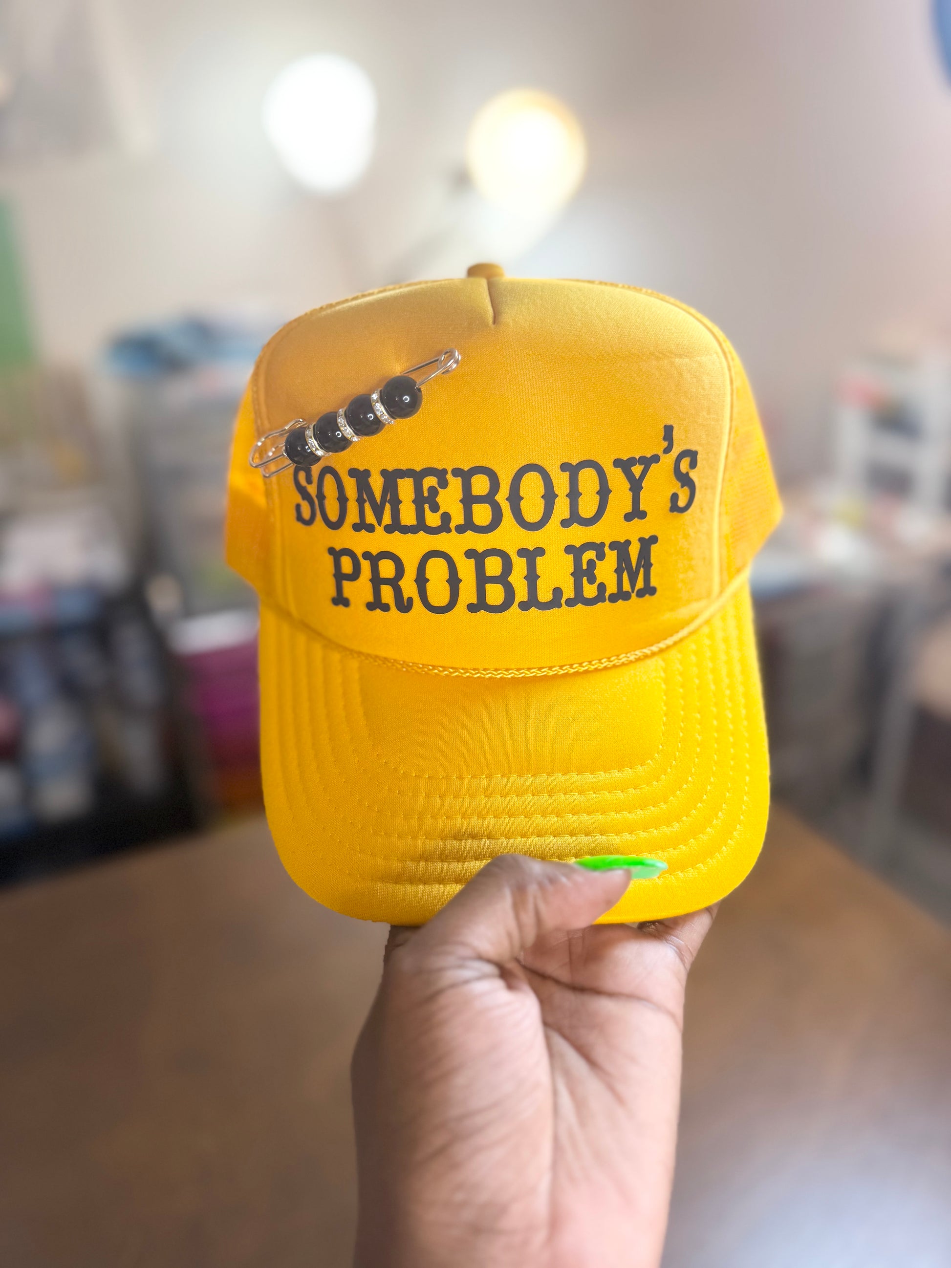 Somebody’s Problem- Gold Hat