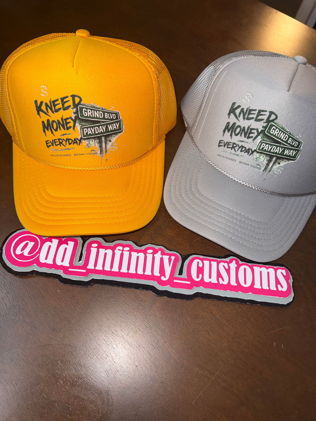 Kneed Money Trucker Hat