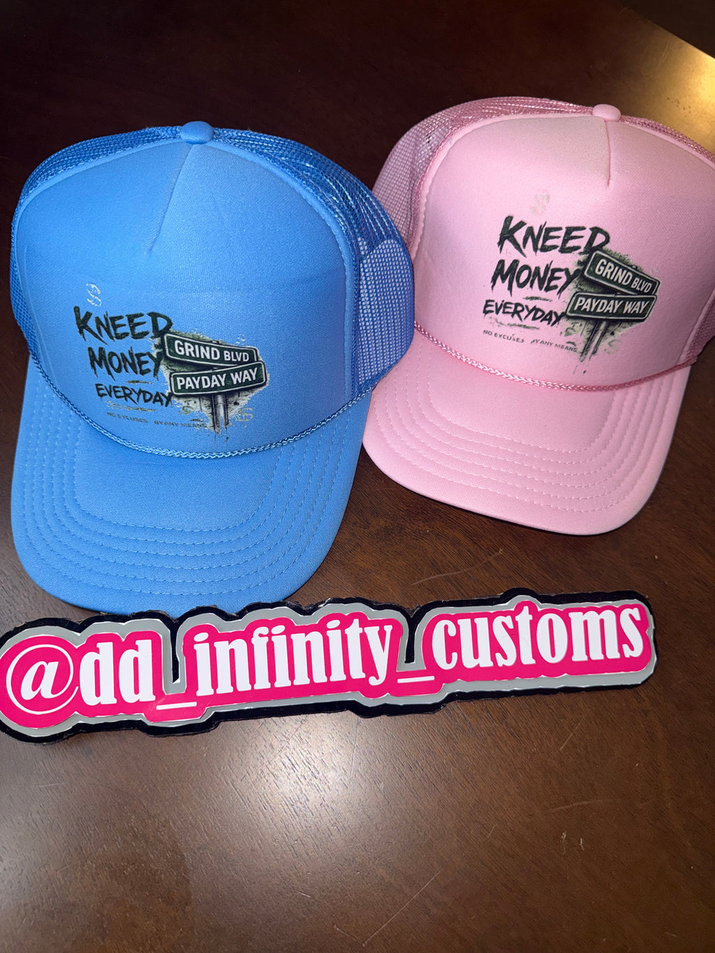 Kneed Money Trucker Hat