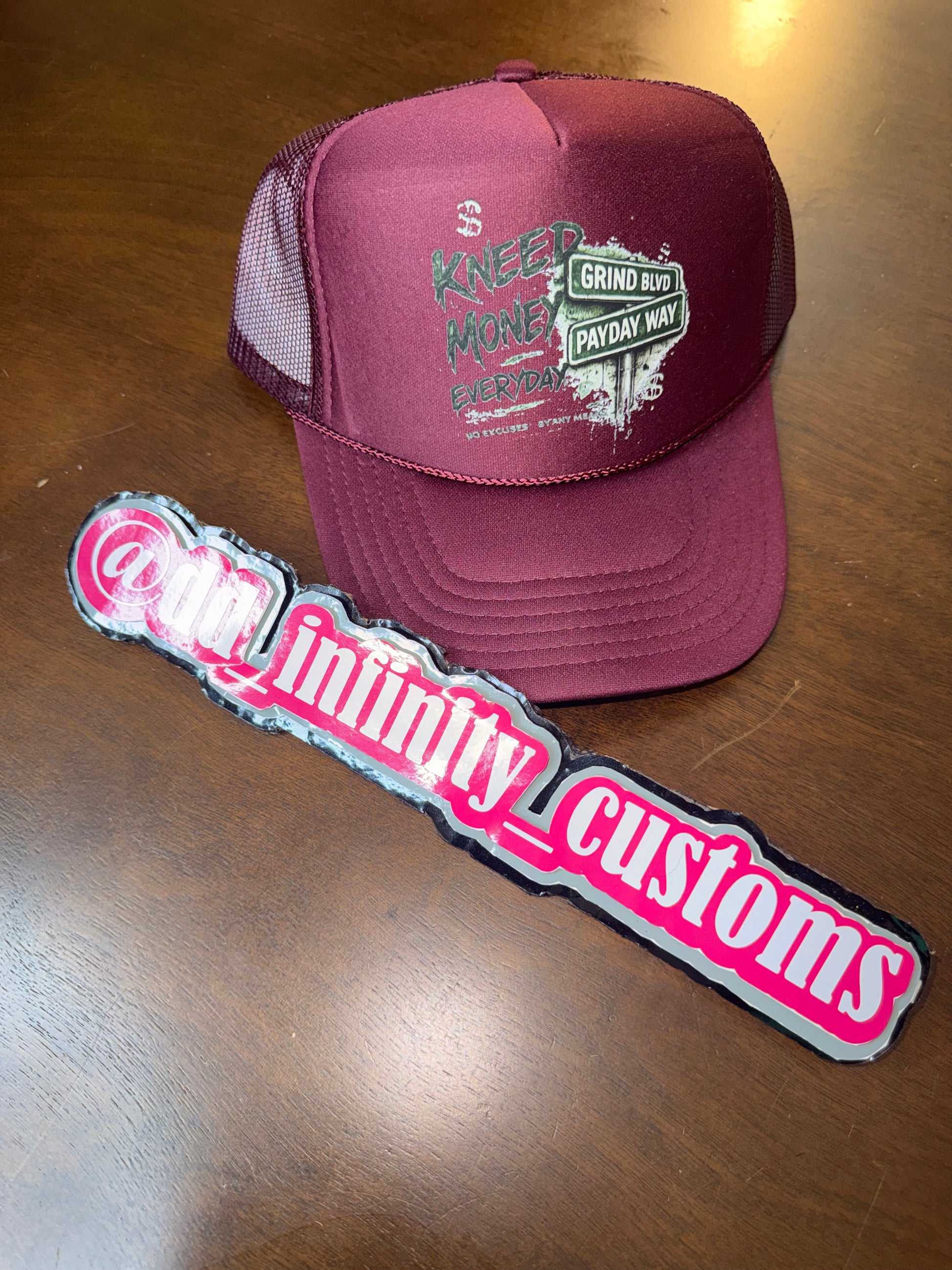 Kneed Money Trucker Hat