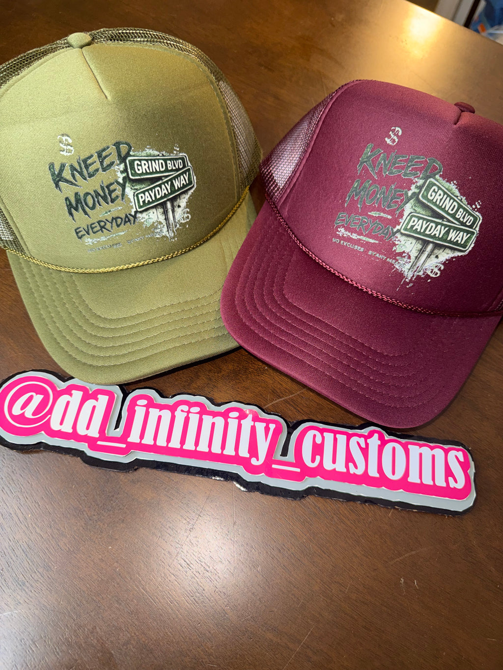 Kneed Money Trucker Hat