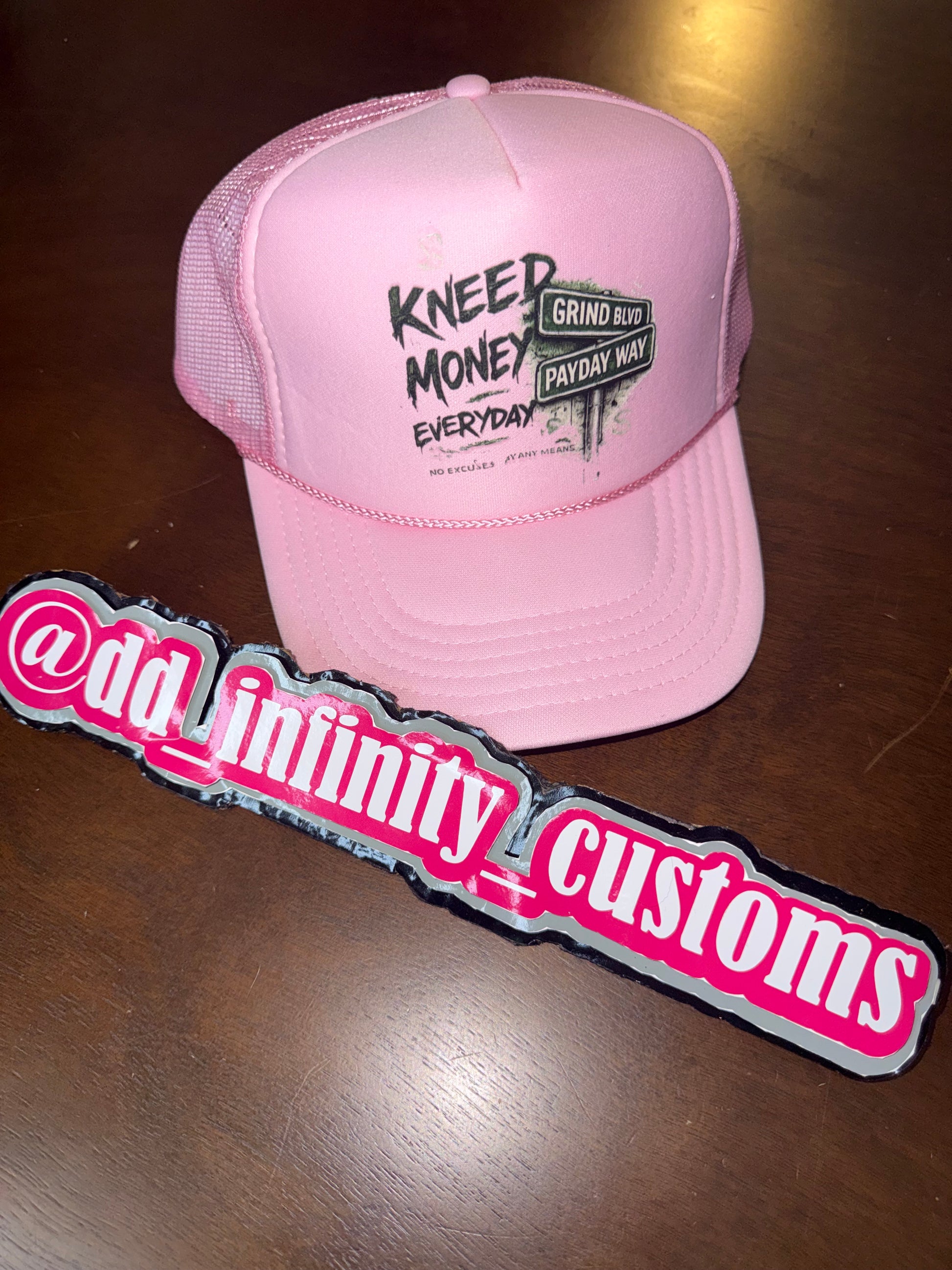 Kneed Money Trucker Hat